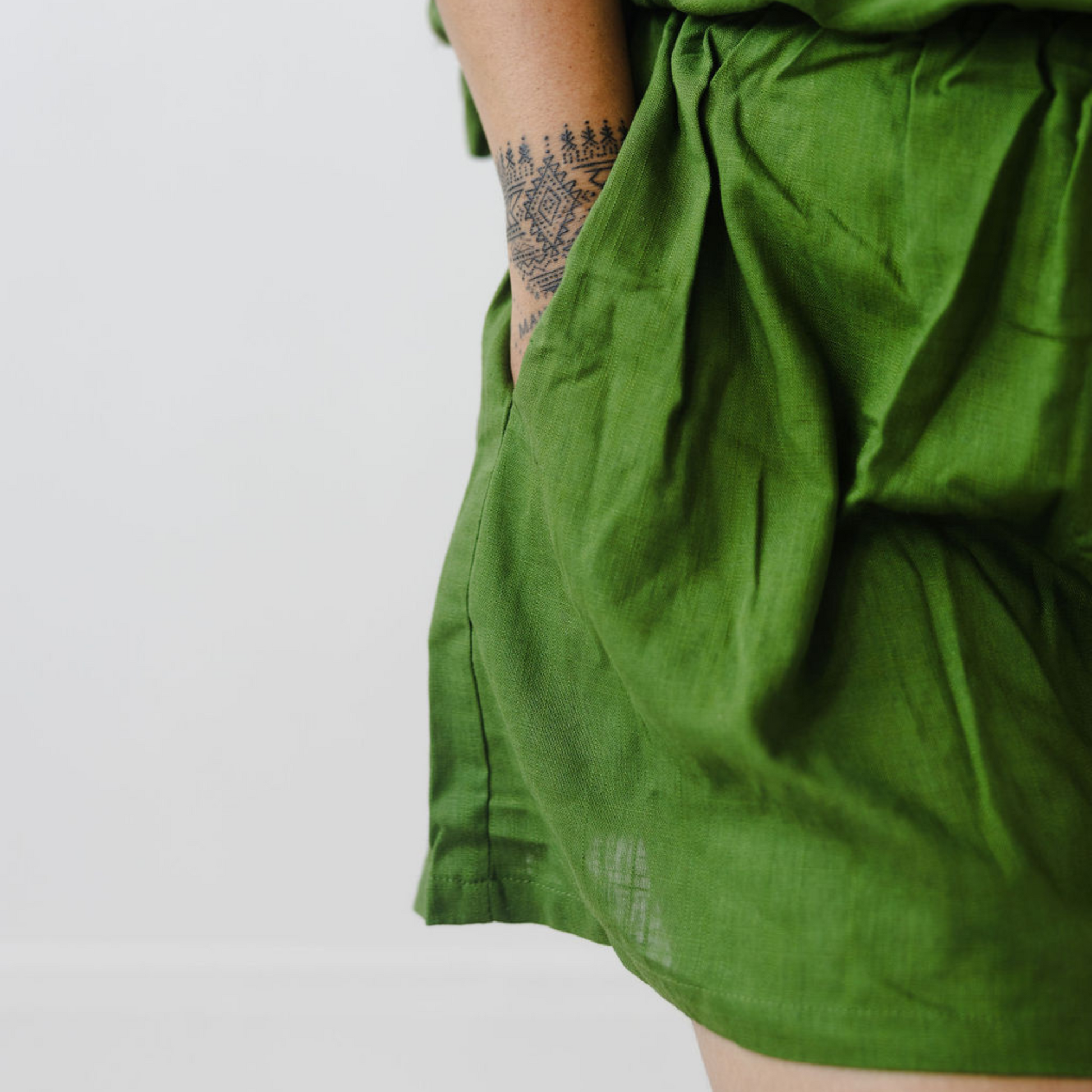 Close up view of Kapua Shorts in olive